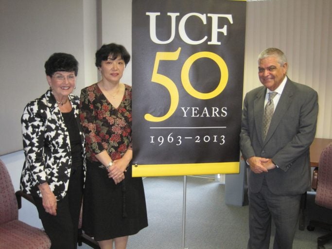 Judy Duda, chair of the Dean's Executive Council for UCF's College of Arts and Humanities, Ayako Yontani, and College of Arts and Humantities Dean José Fernández announce the Ayako Yonetani Music Endowed Scholarship for violin and viola.
