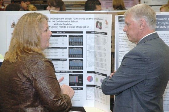 Provost and Executive Vice President, Dr. Tony Waldrop, speaking with presenters at Student Research Week 2012