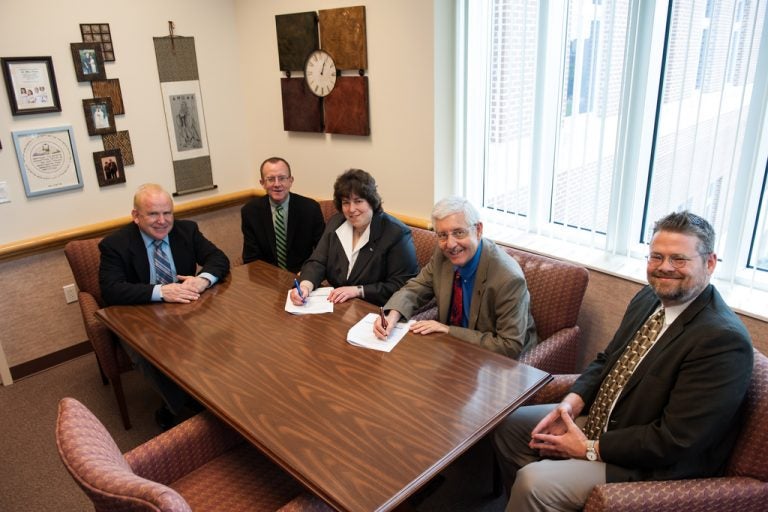 Attending the signing of the UCF-Touro 3+3 program agreement were (left to right) Touro Law Alumnus Bruce K. Gould (’84), Touro Law Assistant Dean for Admissions George Justice, Touro Law Dean Patricia Salkin, UCF COHPA Dean Michael Frumkin and UCF Legal Studies Chair James Beckman. (Photo by Karen Guin)