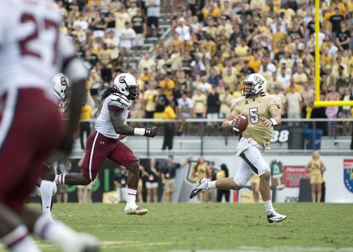 football players on ucf field