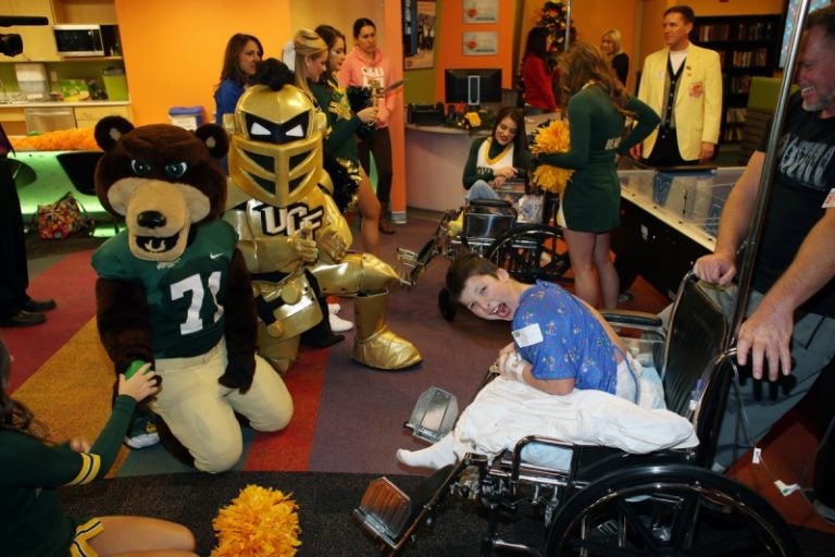 Mascots Bruiser and Knightro visit with children at Phoenix Children's Hospital Tuesday morning (Photo: Tostitos Fiesta Bowl).