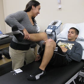 Student receives physical therapy at the Health Center.