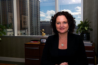 Dianne Owen, '93, executive vice president of marketing for FAIRWINDS Credit Union and chair of the UCF Alumni Association Board of Directors, has a great view of downtown Orlando from her office in the FAIRWINDS building.