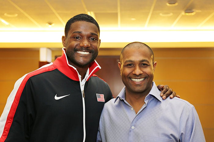 Olympic gold medalist sprinter Justin Catlin (left) is just one of Dr. Gideon Lewis', '00, pro-athlete patients.