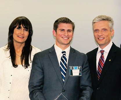 BMC winner Brandon Naids with Pam Hoelzle and Cameron Ford, Ph.D. of the UCF Blackstone LaunchPad.