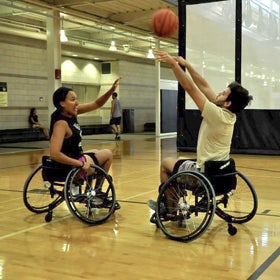 Students engaging in wheelchair basketball at the annual Inclusive Recreation Expo.