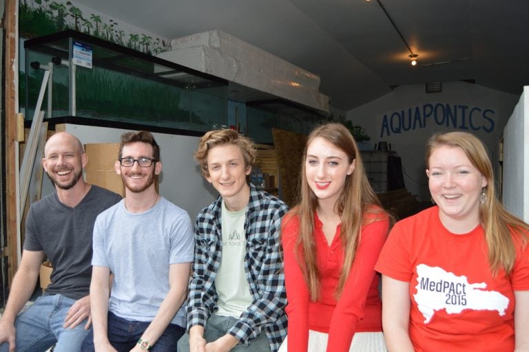 UCF engineering students, from left, Mathew Coalson, Evan Dipsiner, Keenan Bosworth, Caroline Kamm and Rebecca Shea are among the many members of the UCF chapter of Engineers Without Borders to build an aquaponics system to help the Bithlo community.