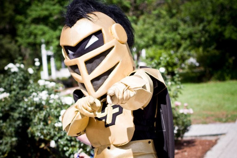 knightro posing and pointing at the camera