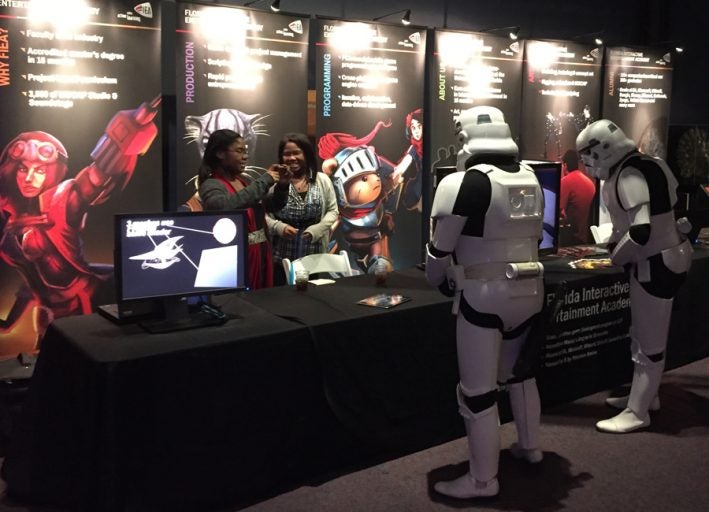 Stormtroopers visit the Florida Interactive Entertainment Academy booth at the 2015 Otronicon.