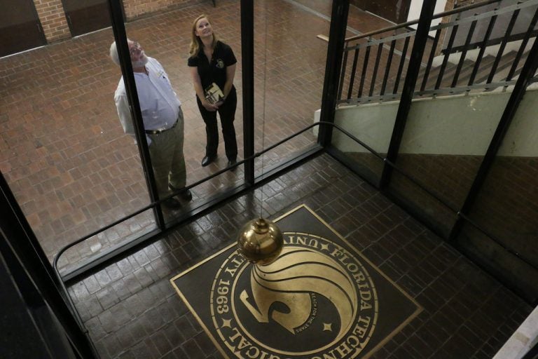 UCF's Pendulum Swings over pegasus logo