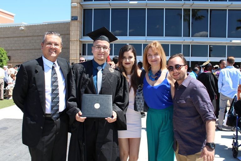 Daniel Gonzalez and his family at Spring 2016 graduation.