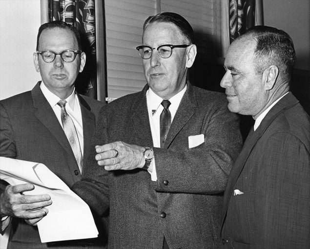 Sen. Charlie Johns (center)