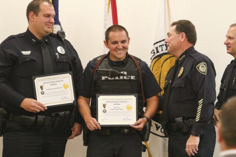 Cpl. Alan Elliot and Ofc. Chris Holt were given Distinguished Service Awards for their response to the terror at Pulse nightclub June 12.