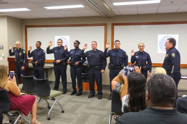 UCFPD Chief Richard Beary swears in Lt. Christine Gigicos and six new patrol officers. Photos: Nick Russett