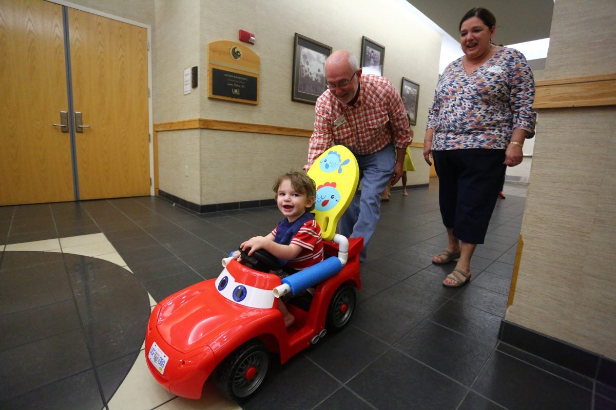Children Who Can t Walk Race Mini Cars at UCF Event Go Baby Go Children Who Can t Walk Race Mini Cars at UCF Event Go Baby Go