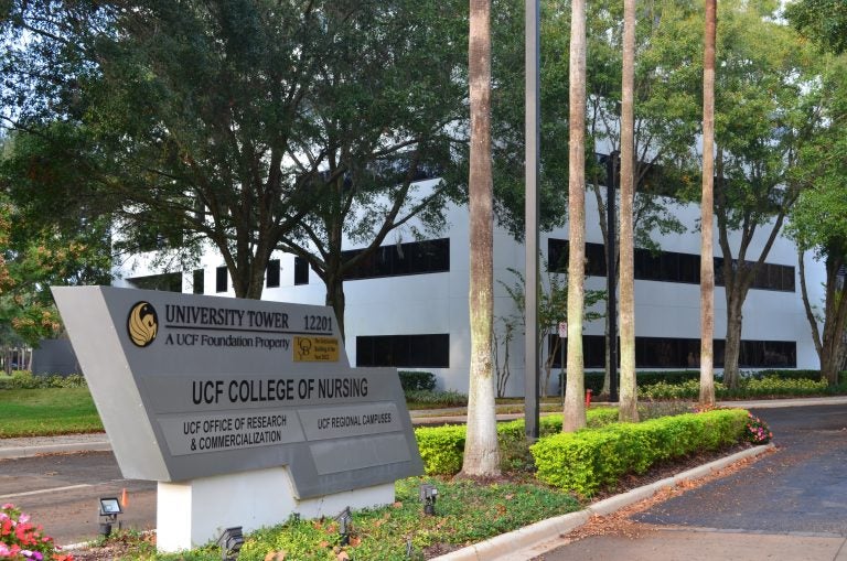 ucf college of nursing sign in front of building