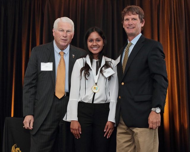UCF student Kiana Boodram was recognized as a 2016-2017 Johnson Scholar by Bobby Krause of the Johnson Scholarship Foundation and UCF President John C. Hitt at a February 22 ceremony on the UCF campus.