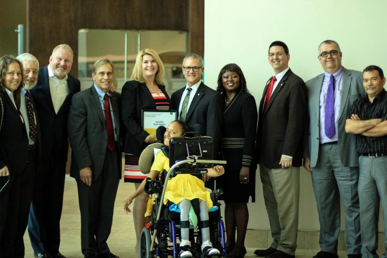 Jennifer Kent-Walsh (middle) received the first Marchioli Collective Impact Innovation Award at a Provost Forum in February.