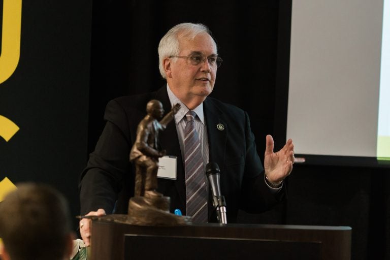 Roger Pynn '73 speaks at the Millican Society luncheon