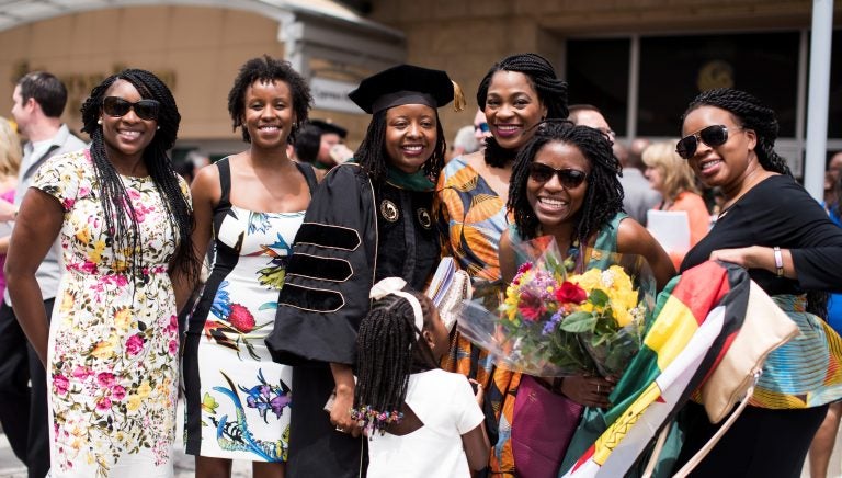 Med School Graduates posing for photo after graduation