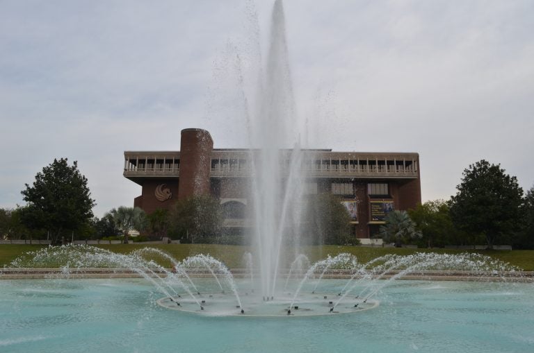 reflecting pond fountain in front of milican hall