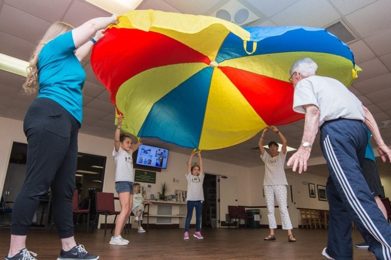 Fifteen participants are part of the first cohort of Grow and Play, a UCF-created program that gets seniors and children exercising together.