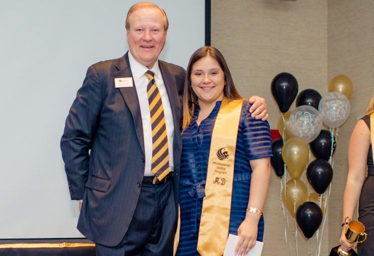 Associate instructor Bill Steiger and first-generation student Merarys “Mery” Diaz.