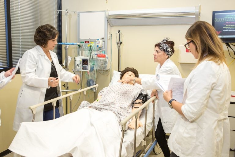 UCF nursing and healthcare simulation students in the STIM Center at UCF College of Nursing.