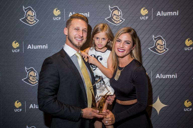 Carey Sobel, left, with his niece Marley and wife Lauren