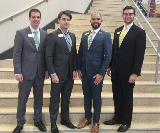 The UCF International Collegiate Sales Competition team is, from left, Jason Cavanaugh, alternate; Ryan Williams, competitor; Omar Nasser, competitor; and Jesse Crumbley, alternate. Williams and Nasser placed second among 70 teams, and Nasser placed second overall in the individual division.