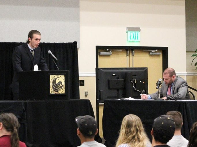 Student actors and professionals from campus and the community play different roles in the mock trial.