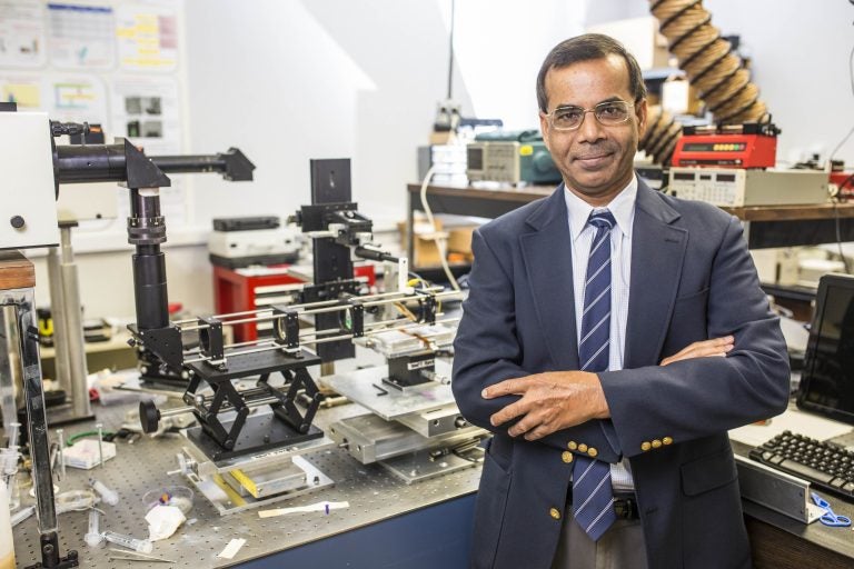 Aravinda Kar in his lab