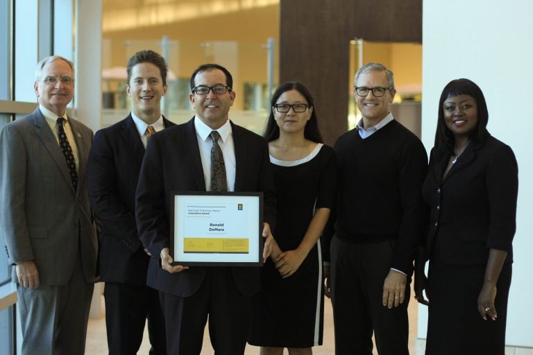 Ronald DeMara (third from the left) is the Fall 2017 Marchioli Collective Impact Innovation Award winner for developing a college-wide testing and tutoring center that’s helping students learn better.