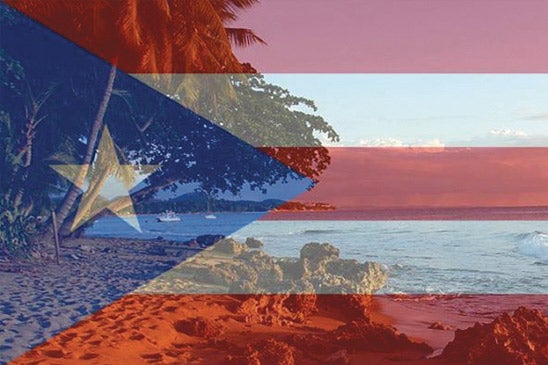 Puerto Rico's flag superiimposed over view of coastline