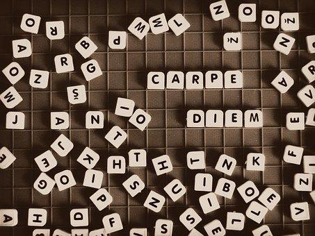 letter tiles spelling out "Carpe Diem"