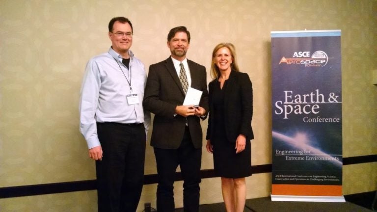 Left: Paul J. van Susante, chair of the ASCE Aerospace Division. Middle: Phil Metzger, UCF/FSI and Right: Kristina Swallow, P.E., ENV SP, F.ASCE, President of the ASCE.