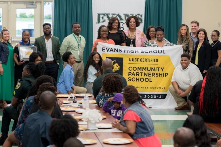 Evans and UCF reprewsentatives at announcement of certification.