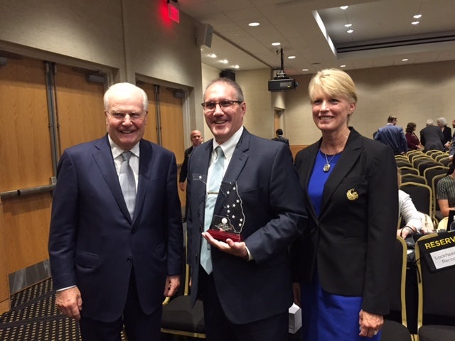 Left to right: Ned Lautenbach, Board of Governors chair; Frank St. John, executive VP of Lockheed Martin's Missiles and Fire Control; Beverly Seay, UCF trustee