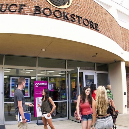 students in front of bookstore