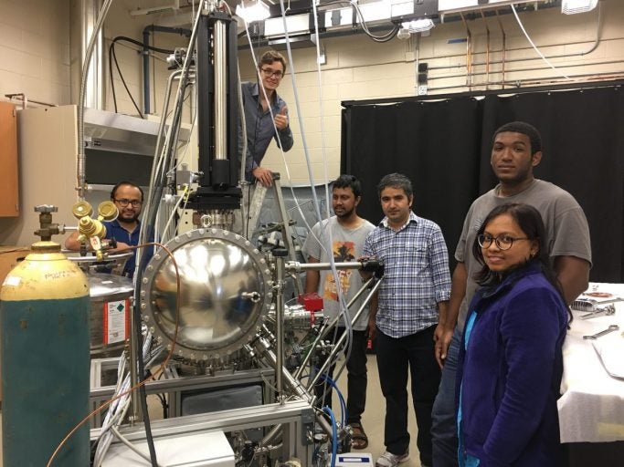 Madhab Neupane and his research team with the in-house ARPES system. From left to right: Gyanendra Dhakal (Graduate student), Klauss Dimitri (Undergraduate student), Md Mofazzel Hosen (Graduate student), Madhab Neupane, Christopher Sims (Graduate student), Firoza Kabir (Graduate student)