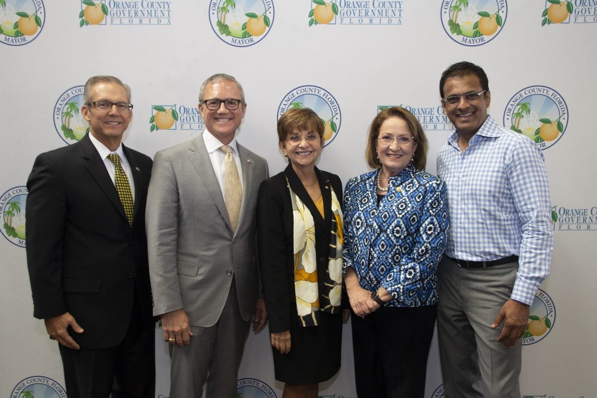 Board of Trustees Chairman Marcos Marchena, President Dale Whittaker, Dr. Deborah German, vice president for health affairs and dean of the UCF College of Medicine, Orange County Mayor Teresa Jacobs, and Rasesh Thakkar, senior managing director of Tavistock Group.