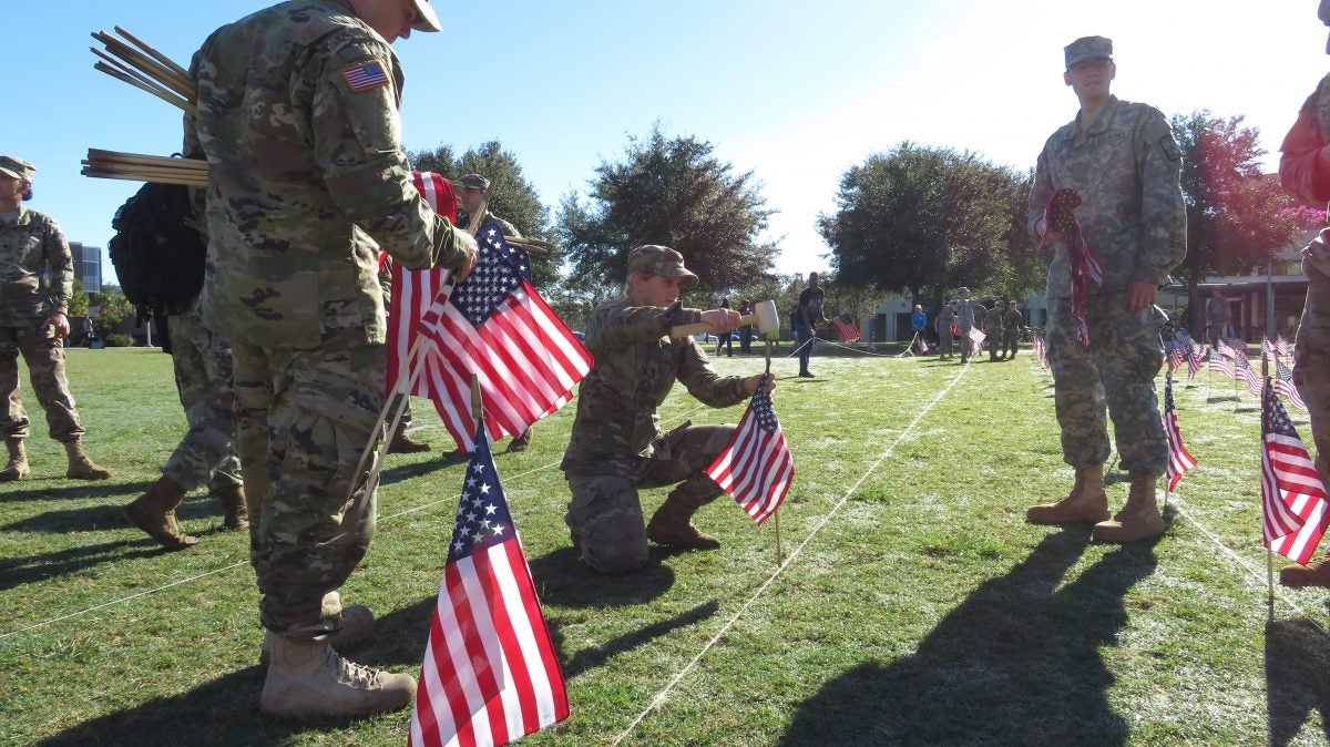 Planting flags at Memory Mall