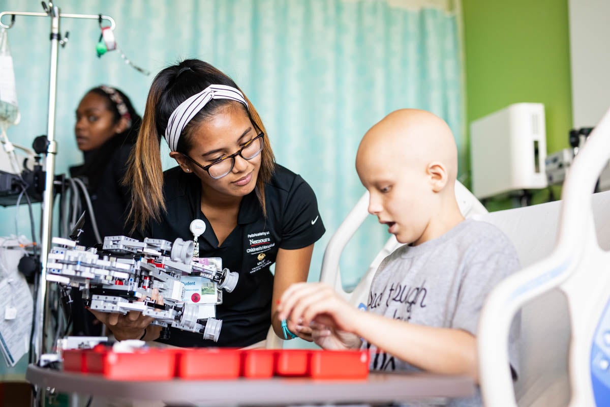 hospitalized student being instructed