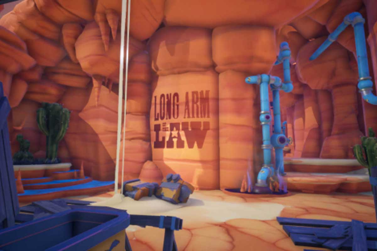 Video game image: orange rock formations with blue pipes