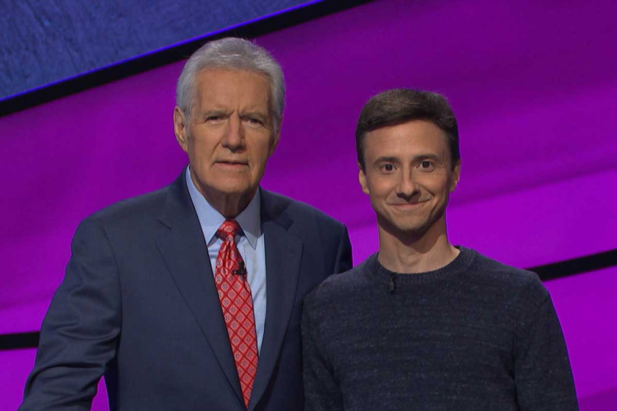 Jeopardy! host Alex Trebek with contestant Imar DaCunha.
