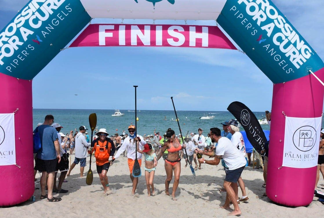 Paddlers crossing finish line