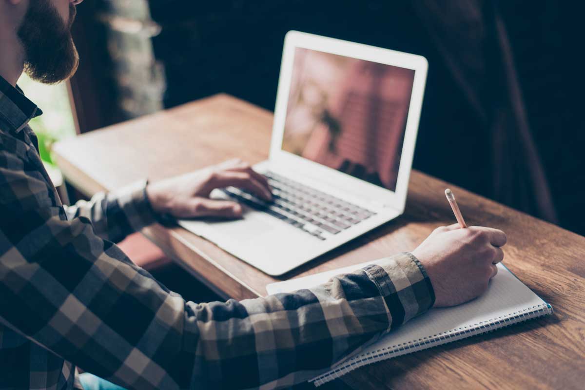 Person working with a laptop.