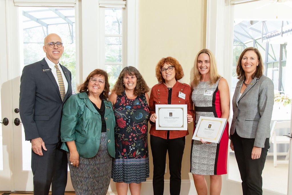 Thad Seymour Jr., Maria Santana, Linda Walters, Julia Listengarten, Anne Burbriski, and Jana Jasinski at the women faculty reception.