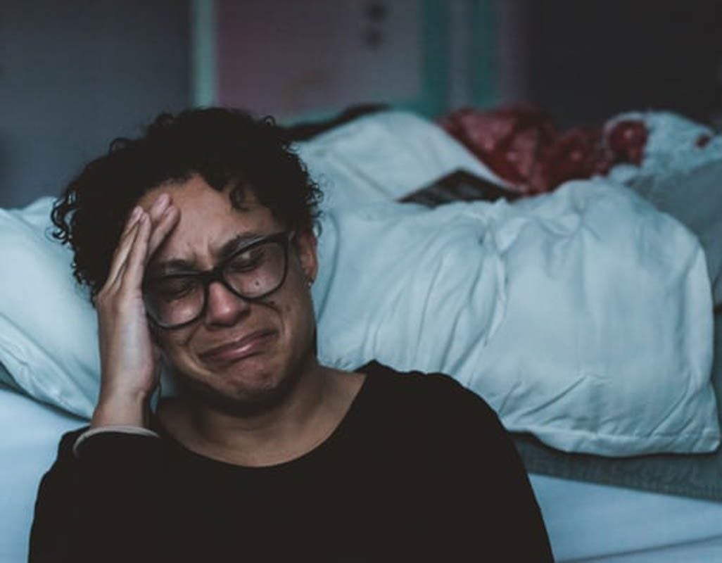 woman with anguished look