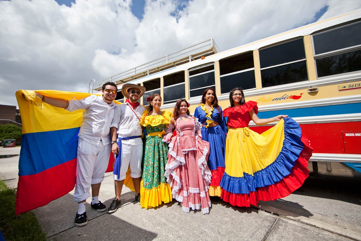 Students dressed in colorful clothing from home countries.